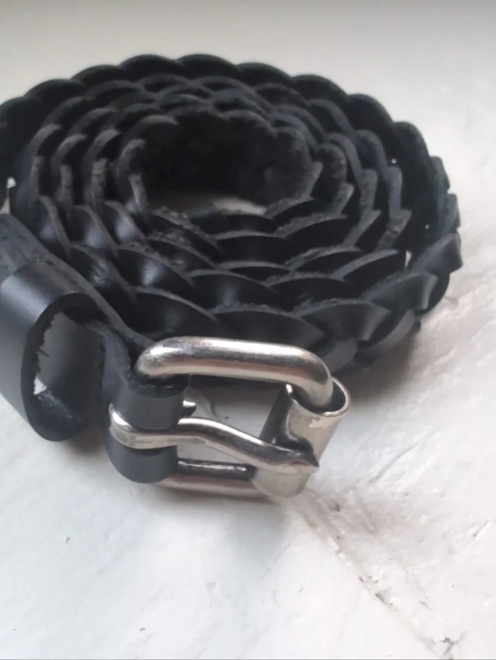 Black real leather fully adjustable braided skinny belt with silver tone buckle